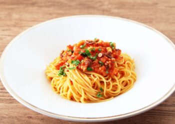 たこのトマトソースパスタの画像